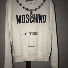 Designer Sweatshirt With Attached Rhinestone Size 38 Designer White Sweatshirt With Logo Print, White Rhinestone Crew Neck Top, White Long Sleeve Tops With Rhinestones, Moschino Sweatshirt, Cottagecore Sweater, Hooded Jean Jackets, Hat Jewelry, Chic Cardigan, Varsity Sweater