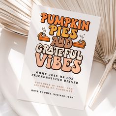 a flyer for pumpkin pies and grateful vibes on a white plate next to an open book