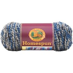 blue and white yarn with the words homepun on it in front of a white background