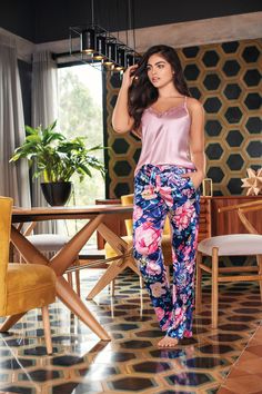 Indulge in the perfect combination of style and comfort with our Floralmix Satin Long PJ Set. Crafted from high-quality satin fabric adorned with a beautiful floral print, this set exudes elegance and luxury. The delicate lace detail on the bust adds a touch of feminine charm. With its long pants featuring convenient pockets and an adjustable belt, this set effortlessly combines practicality and style. Relax and unwind in the lap of luxurious comfort, as this gorgeous set keeps you feeling cozy Relax And Unwind, Pajama Robe, Adjustable Belt, Pj Sets, Long Pants, Pajamas Women, Satin Fabric, Lace Detail, Floral Print