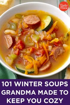 a white bowl filled with soup next to bread