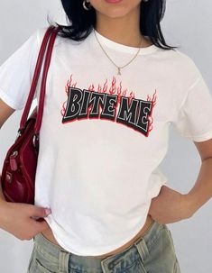 Bite Me Y2K Baby tee, Aesthetic Cropped tee, 90s baby tee, Goth, Punk Trendy shirt, Retro Vintage tee Important: To achieve the Baby Tee look, we use Youth size heavy cotton Gildan 5000B tees. BEFORE ORDERING PLEASE MAKE SURE TO CHECK YOUR MEASUREMENTS.   Heavy Cotton Baby Tee Composition: Solid colors, 100% cotton Sport Grey - 90% cotton, 10% polyester The shoulders have twill tape for improved durability Ribbed knit highly elastic collar with seam helps retain its shape No side seams 💕 Care I Y2k Crew Neck T-shirt With Logo Print, Edgy Red Graphic Print T-shirt, Y2k Summer T-shirt With Graphic Design, Y2k Graphic Design T-shirt For Summer, Y2k Red Graphic Print Top, Y2k Style Summer T-shirt With Graffiti Print, Y2k Summer Graffiti Print T-shirt, Summer Y2k Graffiti Print T-shirt, Graffiti Print Y2k Style Summer T-shirt