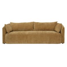 a brown couch sitting on top of a white floor