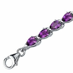 Inspired by a love of luxury Dress it up or dress it down. But don't leave the palace gardens without this crown jewel. This classic bracelet features pear shape Peora natural Amethyst gemstones in .925 sterling silver. Our natural Amethyst gemstones are a unique gift from nature. By cutting them in a way that respects the rough's natural radiance, we ignite their inherent intensity and maximize their brilliance to deliver on our signature Peora standard. Handcrafted in pure .925 sterling silver Palace Gardens, Blue Topaz Bracelet, Classic Bracelets, Round Stud Earrings, Amethyst Bracelet, Silver Style, Royal Purple, Luxury Dress, Pretty Earrings