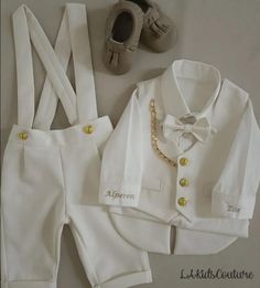 Personalized boys baptism suit set. Boys 1st birthday suit set with carrier pants, boys tuxedo shirt, boys bowtie, boys personalized tie, vest and suspenders.  Boys romper suspenders are adjustable and tuxedo shirt can be personalized. Suspenders are removable and the pants have a large reserve for buttons. This outfit is a perfect ring bearer outfit , baptism ceremonies or as boys first birthday suit. Wedding bridal party personalized ring boy suit or as personalized boys baptism suit  -Available from newborn up to 4 years old. -All our items are made to order so feel free to contact Us with any custom color requests. *Listing includes: - Pants with suspenders  - Boys personalized tuxedo shirt -Boys bowtie -Boys vest *Newsboy Cap can be ordered to make your baptism or wedding pictures loo Bautizo Ideas Boy Outfits, Ring Boy Outfits, Ivory Ring, Boy Baptism Outfit, Boys Tuxedo, Ring Boy, Baptism Outfit, Personalized Tie, Tuxedo Shirt