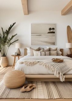 a bedroom with a bed, rugs and two lamps on either side of the bed