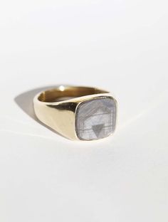 This is a traditional, square-shaped signet ring with sapphire gemstone. Natural sapphires form in a hexagonal structure, which provides a unique appearance when the stone is cut to retain a stripe or color block. Each stone is chosen for its own particular qualities and cut by hand, therefore one of a kind. Specifications: 14k gold 10mm gray/blue sapphire stone, textures per stone will vary from photo. We will follow up with you about availability. 3mm band at back of ring. ﻿ Custom sized in approx. 4 weeks. Contact us for rush orders. Please contact us for sizes not listed shop@machastudio.com Please note custom sized pieces are not valid for refund or exchange. Sapphire Signet Ring, Blue Sapphire Stone, Rings Mens, Traditional Engagement Rings, Square Stone, Diamond Charm, Womens Wedding Bands, Sapphire Stone, Natural Sapphire