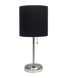 a table lamp with a black shade on the base and a silver plated base