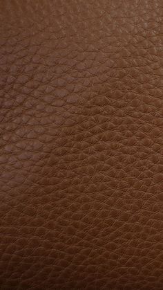 the texture of a brown leather background