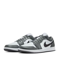 Step into timeless style with the Air Jordan 1 Low, inspired by the 1985 classic. Featuring a durable leather upper, lightweight Air-Sole cushioning, and a rubber outsole for excellent traction, these sneakers blend iconic design with modern comfort for any outfit. Classic Gray Sneakers With Cushioned Footbed, Classic Gray Sneakers With Contrast Sole, Classic Gray Sneakers With Boost Midsole, Classic Gray Custom Sneakers For Sports, Classic Custom Sneakers With Boost Midsole, Classic Low-top Cushioned Golf Shoes, Classic Low-top Golf Shoes With Cushioned Footbed, Classic Custom Sneakers With Cushioned Footbed For Light Sports, Classic Custom Sneakers With Cushioned Footbed