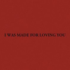 the words i was made for loving you against a red background with black text on it