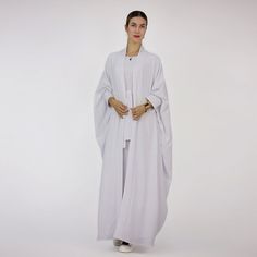 Feature： High-Quality Material, soft and comfortable Can be worn all year round. 2 Pieces set, With Outer Abaya And Sleeveless Inner Dress Excellent gift ideas. Specifications： Material: Heavy Wrinkle Gender: Female Age group: Adult Size: S-2XL Size Guide： Shipping: Now, we provide free shipping to United States, United Kingdom, Canada, Saudi Arabia, Australia, China, Denmark, Finland, Poland, Romania, India, Japan, Turkey, United Arab Emirates, Israel, Bulgaria, Hungary, Indonesia, Tajikistan, Casual Solid Color Abaya For Spring, Casual Solid Abaya For Spring, Casual Abaya For Spring, Spring Daywear Abaya, Intellectual Style, Long Skirt Fashion, Irregular Patterns, Muslim Outfits, Langer Rock