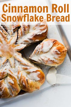 cinnamon roll snowflake bread with icing on top