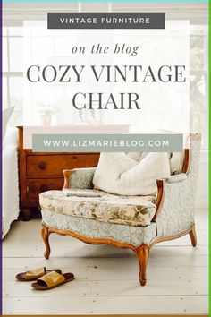 an old chair sitting in front of a window with text overlay that reads vintage furniture on the blog cozy vintage chair