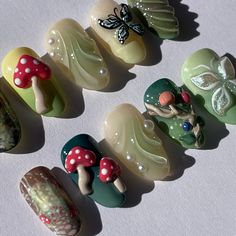 enchanted forest custom set 🍄🌳✨ vine nail ib @setsxnenita mushrooms ib @innerbloom.nails . . . #pressonnails #pressonnailbusiness #nailart #naildesign #3dnailart #handpaintednailart #enchantedforest #forestnails #naturenails #mushroomnails #butterflynails Short Mushroom Nails, Innerbloom Nails, Enchanted Forest Nails, Mushrooms Nails, Nails Cottagecore, Mushroom Nail Art, Mushroom Nails, Painted Nail Art, 3d Nail Art