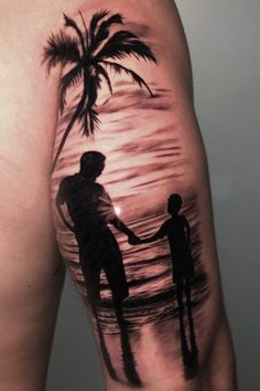 a man with a tattoo on his arm holding the hand of a woman who is standing under a palm tree