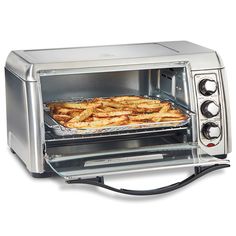 a toaster oven with food cooking in it