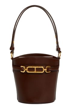 Gilded T-bit hardware brings heritage shine to this Italian-crafted bucket bag boasting a structured silhouette and rich calfskin-leather construction. Magnetic closure Shoulder strap Structured silhouette with flat base for stability Canvas lining Leather Made in Italy Designer Handbags High-end Bucket Bag With Gold-tone Hardware, High-end Bucket Bag With Gold-tone Hardware And Top Handle, High-end Top Handle Bucket Bag With Gold-tone Hardware, Brown Bucket Bag With Brass Hardware, Luxury Bucket Bag Tote With Gold-tone Hardware, Luxury Bucket Bag With Gold-tone Hardware, Luxury Bucket Bag With Brass Hardware, Timeless Formal Bucket Bag With Gold-tone Hardware, Formal Leather Bucket Bag With Brass Hardware