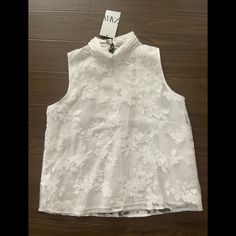 Zara Flora Print Oganza Blouse Elegant Sleeveless Lace Blouse For Summer, Sleeveless Lace Top For Spring, White Sleeveless Blouse For Spring, White Sleeveless Lace Top For Spring, Chic Sleeveless Lace Top Blouse, Spring Sleeveless Lace Top Blouse, Chic Lace Sleeveless Blouse, Spring Sleeveless Lace Blouse, White Sleeveless Blouse With Floral Embroidery