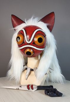 A stunning Wolf Princess mask with a fur cape and ears will complement your cosplay costume or holiday look! *Functions:* - Lightweight and ultra-durable (molded plastic) - ALREADY COMPLETED, POLISHED AND PAINTED - fur can be unfastened - the ears are made of eva and sewn to fur Size: - height 23 cm -width 20.5cm *Does not require finishing. Buy. Receive. Wear.* You can contact me for a custom order if you need a different color (or a different design). *IMPORTANT* International shipping average Princess Mononoke Cosplay, Wolf Princess, Princess Mask, Wolf Cosplay, Super Princess, Painting Fur, Your Cosplay, Cosplay Mask, Fur Cape