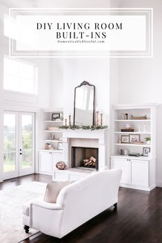 the living room is clean and white with lots of furniture in it, including a fireplace