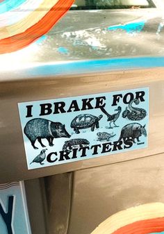 i brake for critters sticker on the side of a car