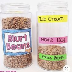 two jars filled with different types of food and labeled in words that read, bluut beans movie day extra recess ice cream