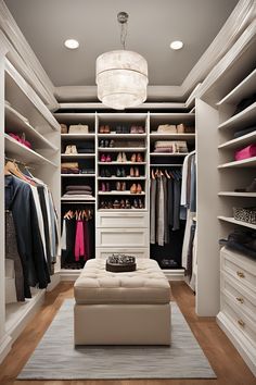 a walk in closet filled with lots of white furniture and shoes on top of shelves