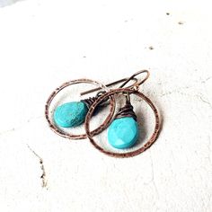 "Two genuine faceted turquoise semi precious teardrop shaped stones are dangled inside a hand hammered copper circle. They measure 1 1/4\" from the top of the copper earwire and measure 3/4\" wide. Very Lightweight and comfortable for all day wear. All my jewelry comes in a box with a decorative ribbon ready for gift giving whether it is a gift for you or someone special. See more of my jewelry designs here: https://www.etsy.com/shop/JensBeadBox Thank you for visiting Jen's Bead Box Jewelry!" Genuine Turquoise Jewelry, Beaded Boxes, Semi Precious Stone, Hammered Copper, Box Jewelry, Genuine Turquoise, Natural Turquoise, Turquoise Earrings, Turquoise Jewelry