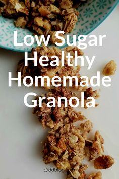 low sugar healthy homemade granola on a plate with the words low sugar healthy homemade granola