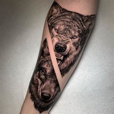 two wolf tattoos on the arm and leg