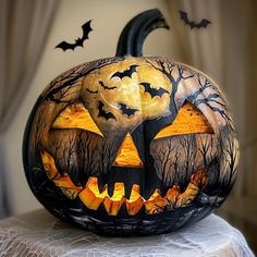 a carved pumpkin sitting on top of a table