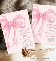 two cards with pink bows on them