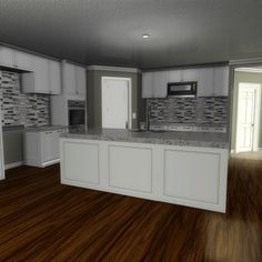 an empty kitchen with wood floors and white cabinets