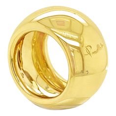 Pomellato 15mm wide band ring set in 18K yellow gold. Curved, bold, and simplistically elegant. The quintessential style of this legendary Milano-based brand. Pre-owned in good condition. Minor wear marks along the edges of the shank.   Details: - Designer: Pomellato - Ring Color: Gold - Metal: 18K Yellow Gold - Ring Size: 6 - Era: 2000's - Total Ring Weight (Grams): 22.9 Grams - 15mm band width  - 4.8mm width between fingers - 1.0mm band thickness  Item can be polished and restored to "like-new Wide Band Engagement Ring, Pomellato Ring, Wide Band Ring, Silver Signet Ring, Contemporary Ring, Cabochon Ring, Gold Band Ring, 18k Yellow Gold Ring, Modern Ring