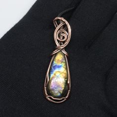 Handmade oxidized 100% copper pendant with bright multicolored labradorite teardrop cabochon. Pendant will come with cord necklace and microfiber cloth. Hand Wrapped Copper Teardrop Jewelry, Bronze Teardrop Jewelry In Copper Wire, Brown Electroformed Teardrop Jewelry, Copper Pendant, Cabochon Pendant, Teardrop Pendant, Copper Chain, Copper Pendants, Oval Pendant