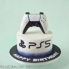 a birthday cake with a video game controller on top