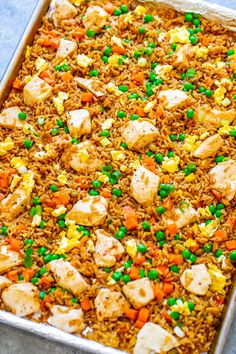 chicken and rice casserole with peas in a pan