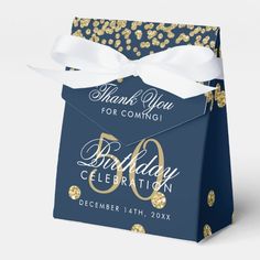 a blue and gold birthday celebration gift bag