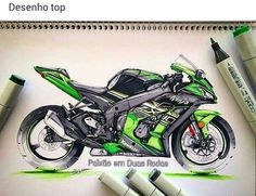 a drawing of a green motorcycle on paper with markers next to it and two pens