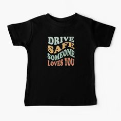 a black baby t - shirt with the words drive safe someone loves you