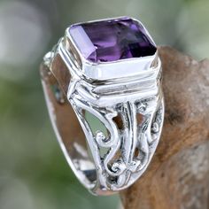 Nyoman Rena designs a handsome ring for men crowned with amethyst, stone of sincerity and spiritual wisdom. Rena crafts the sterling silver ring by hand, masterfully adorning it with artistic openwork. The gemstone totals 3 carats. .925 Sterling silver Silver Rings For Men, Paw Print Jewelry, Printed Jewelry, Mens Silver Rings, Dress Rings, Sterling Silver Mens, Men's Ring, 3 Carat, Amethyst Stone