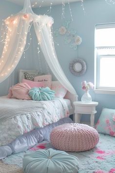 a bedroom decorated in pastel blue and pink