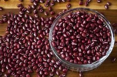 red beans in a glass bowl on a wooden table