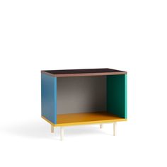 the side table has two different colored sections on each side and one is white, yellow, green, blue