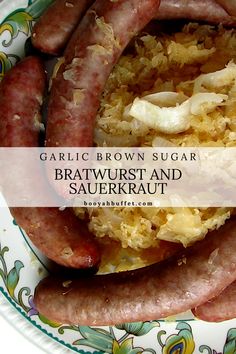 some sausages are on a plate with sauerkraut