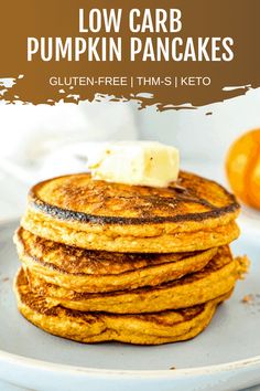 stack of low carb pumpkin pancakes with butter on top and text overlay reading low carb pumpkin pancakes gluten - free tims keto