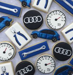 an assortment of cars and gauges decorated cookies