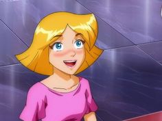 a cartoon girl with blonde hair and blue eyes