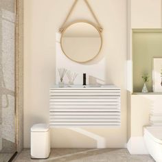 a white bathroom with a round mirror on the wall